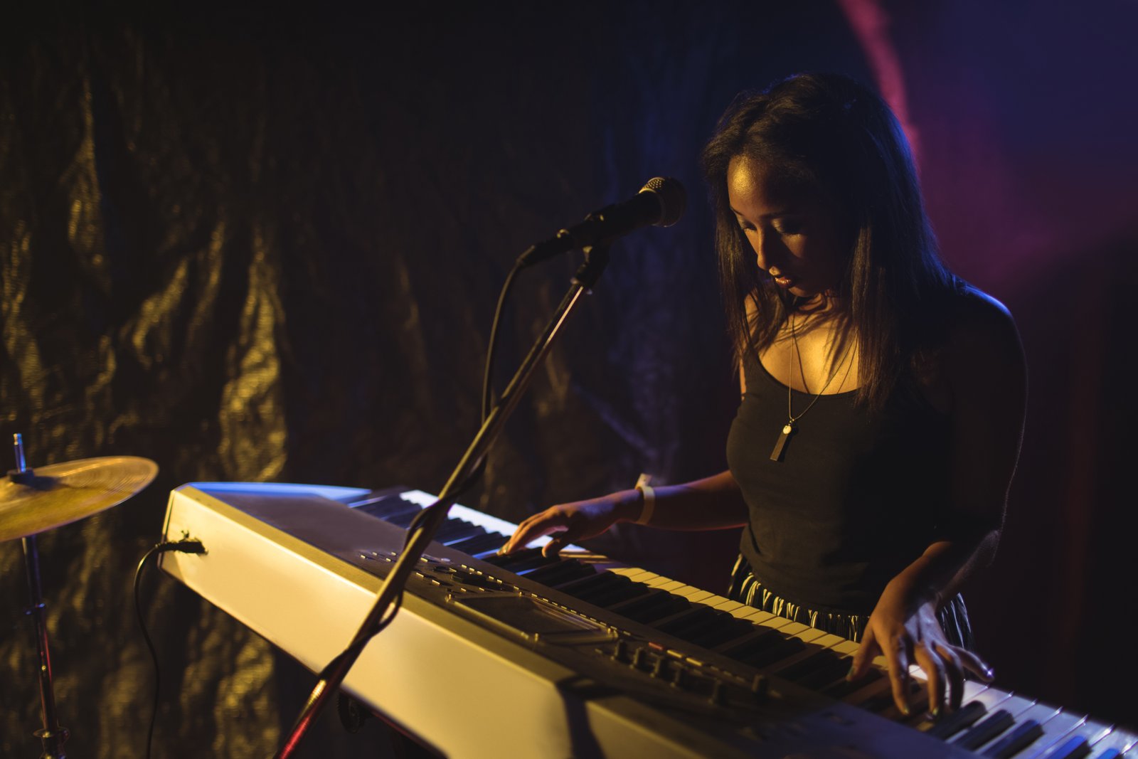 Independent musician performing live on stage